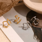 Symmetric Abstract Mask Stud Earrings